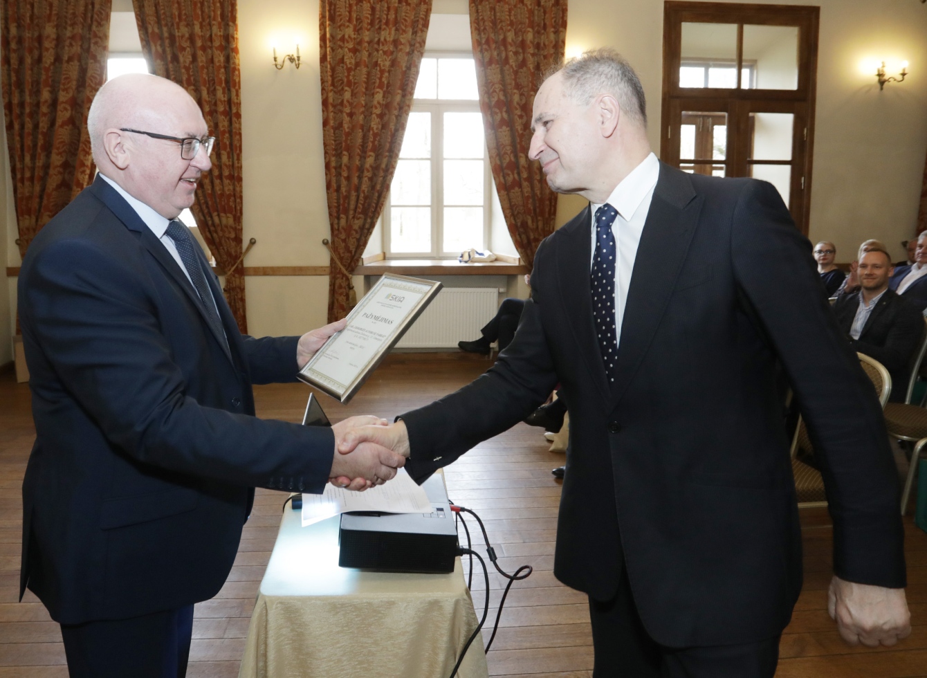 Sveikinamas R.Olšauskui